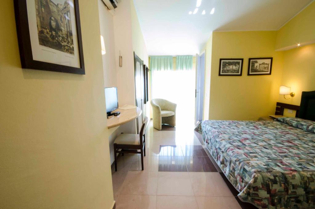 Postel nebo postele na pokoji v ubytování Hotel Tarconte