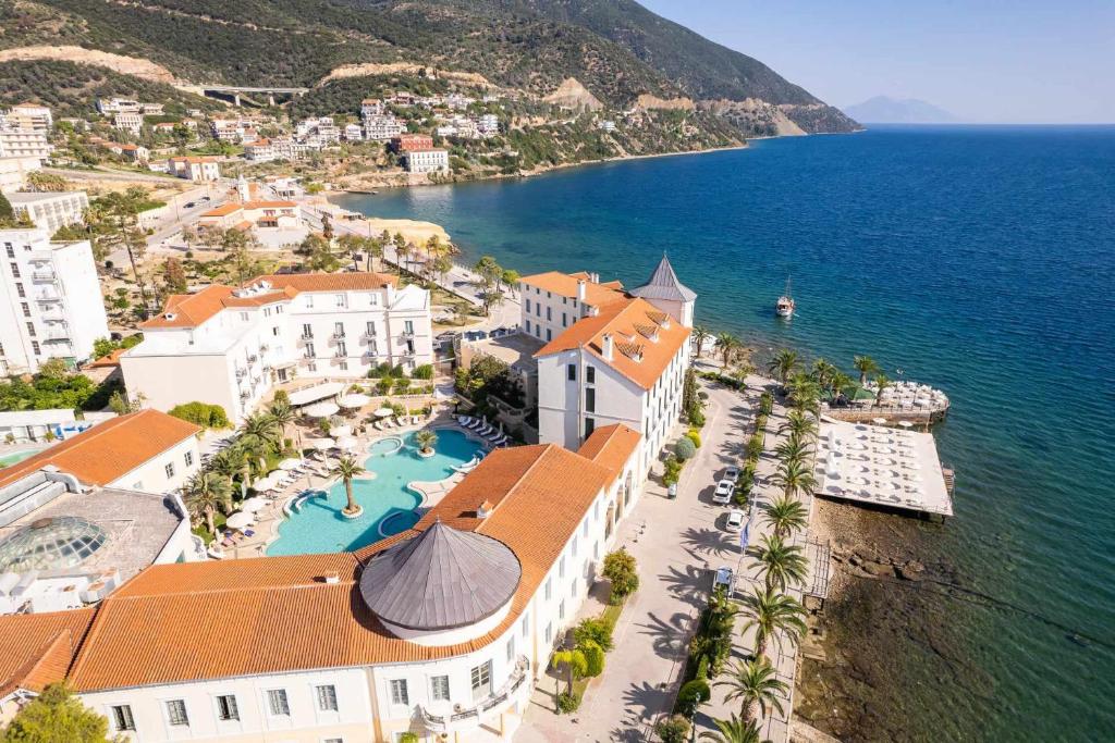 an aerial view of a resort next to the ocean at Thermae Sylla Spa & Wellness Hotel in Loutra Edipsou