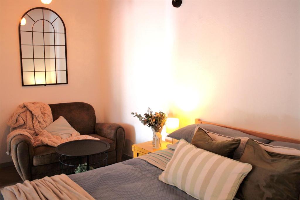 Ruti's House - Monolocale con travi a vista vicino Malpensa e Milano Rho Fiera - Housity