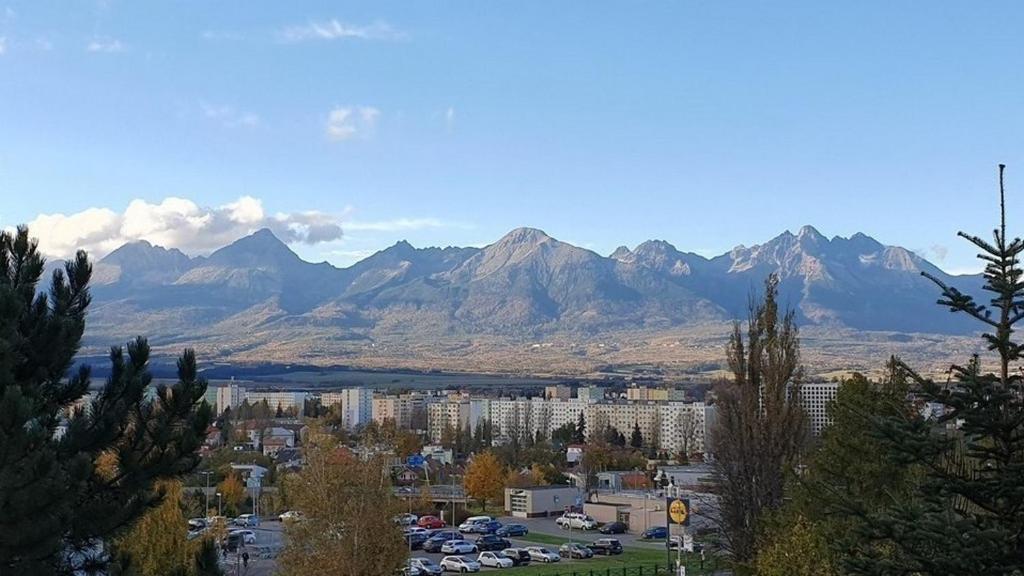 a view of a city with mountains in the background at Apartmán Mikaela 68 m2 in Poprad