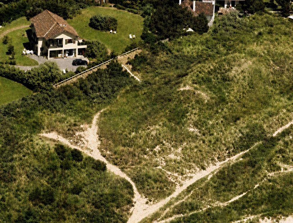 an aerial view of a house on a hill at Panorama d'EXCEPTION vue Dunes & Mer centre et plage à pied La Crête des Dunes Maison complète ou APT uniquement in Le Touquet-Paris-Plage