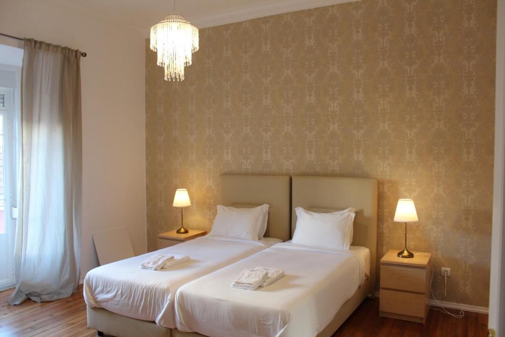 Postel nebo postele na pokoji v ubytování The Sky Lofts Lisbon - Guesthouse