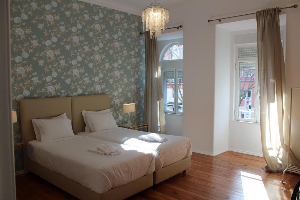 Postel nebo postele na pokoji v ubytování The Sky Lofts Lisbon - Guesthouse