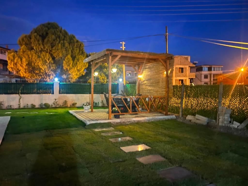 a gazebo in a yard at night at Urla Garden House in Urla