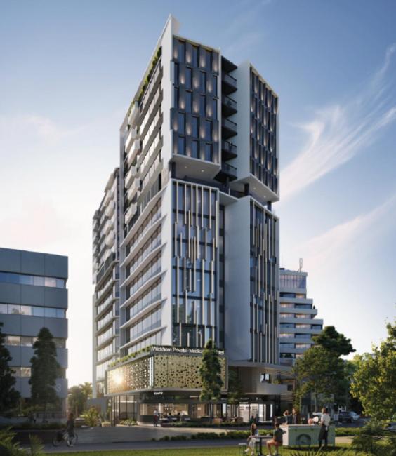 a tall building with people walking in front of it at Quest on Wickham Terrace in Brisbane