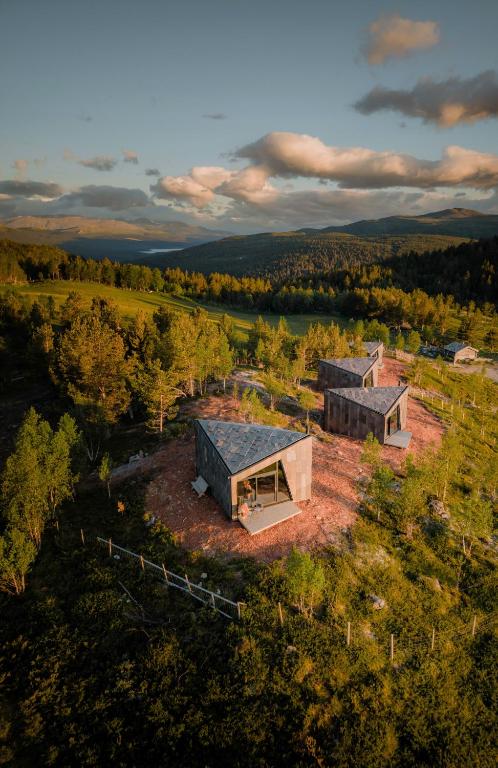 an overhead view of two houses in a field at Hylja Lodge in Vaga