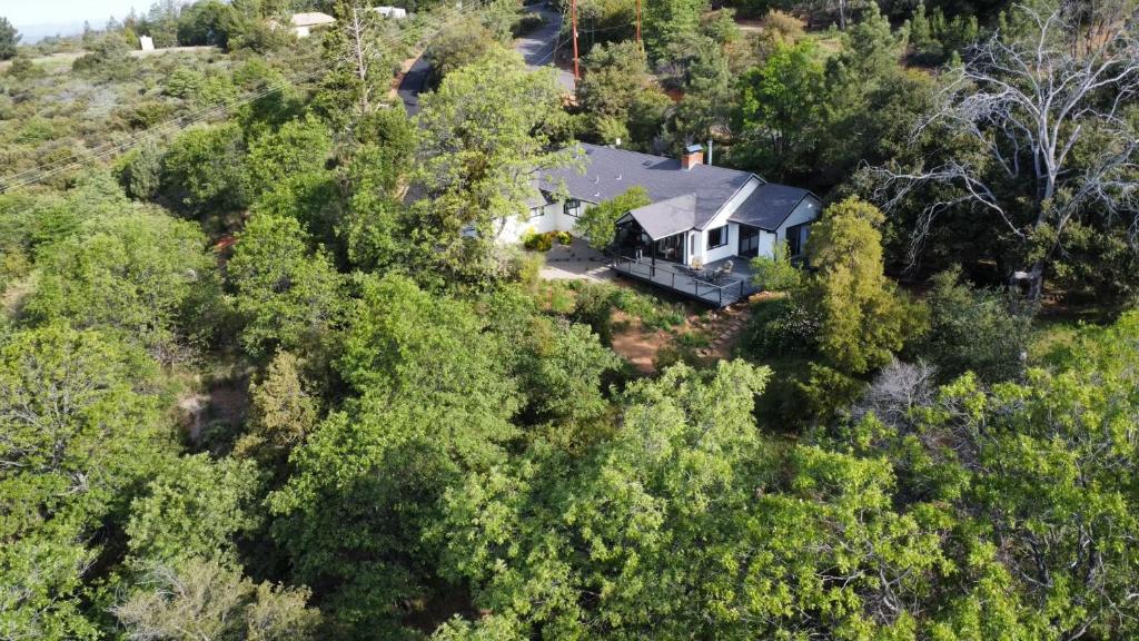 an aerial view of a house in the woods at EPIC VIEWS, Large Deck, BBQ, Private, Close to Julian, Great for Families or Entertaining in Julian