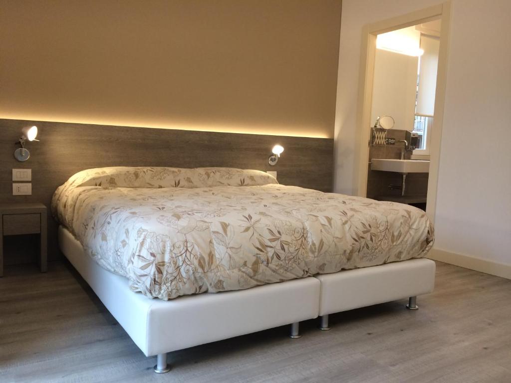 Postel nebo postele na pokoji v ubytování Dolce Notte