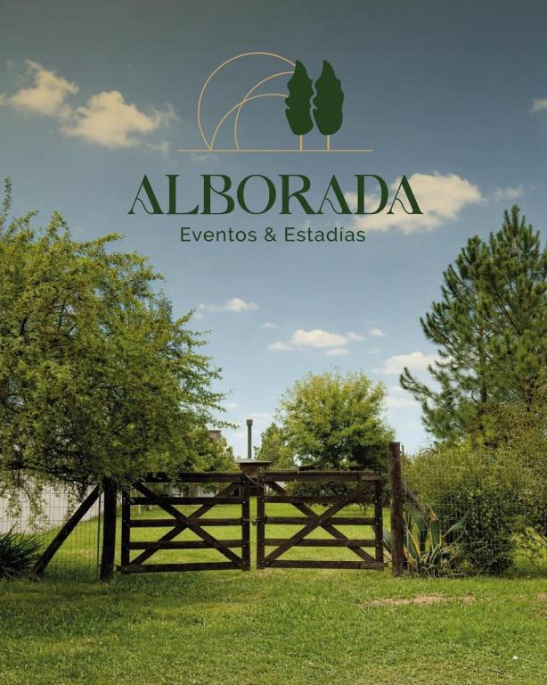 a sign for an albertario events and estates at Alborada in Gualeguaychú