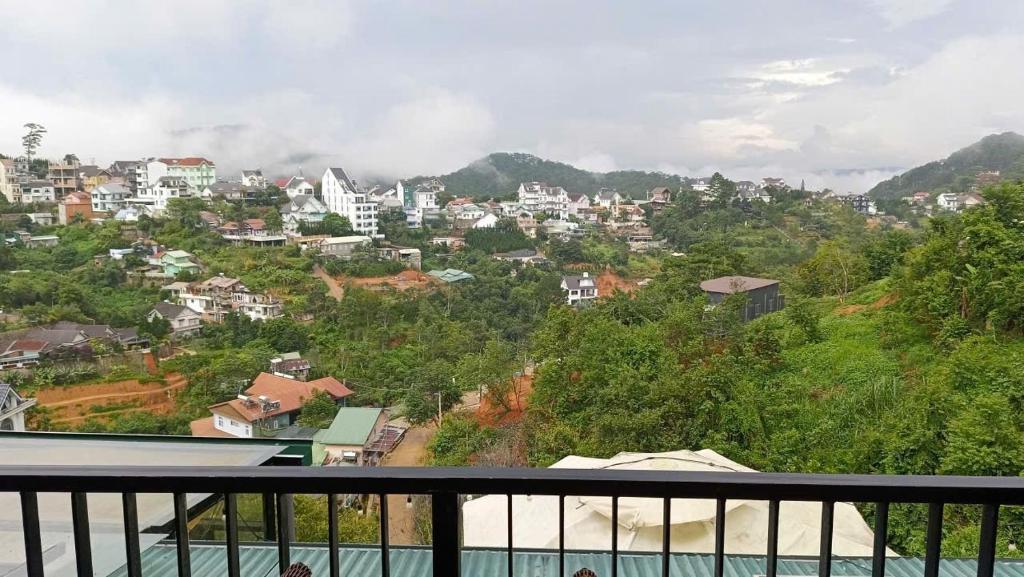 a view of a city from a balcony at Homestay Lê Thảo in Ấp Ða Lợi