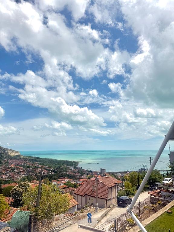 a view of the ocean from a city at E2 Residence in Balchik