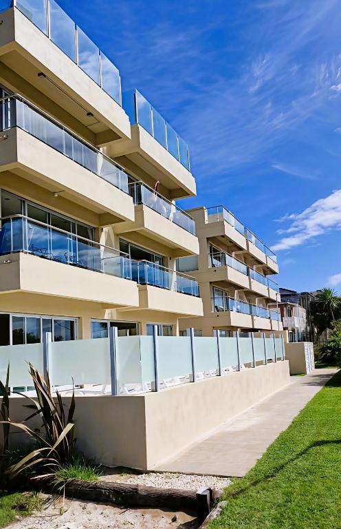 an apartment building with balconies on the side at Arenas del Este in Costa del Este