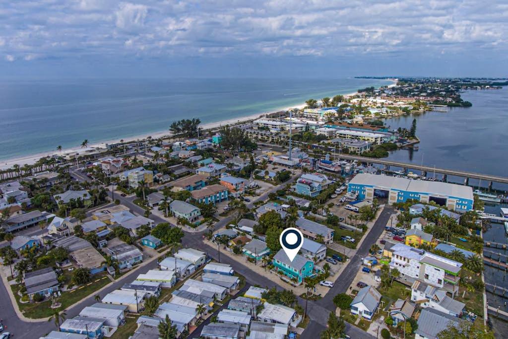 an aerial view of a city next to the ocean at Bay View Inn 202 in Bradenton Beach
