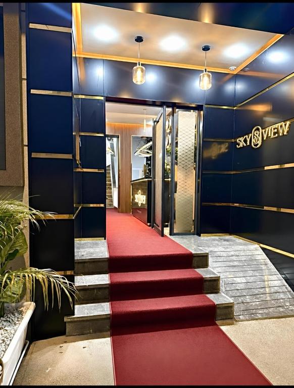 a red carpet path in front of a building at Sky View by Luxurious Holidays in Rabat