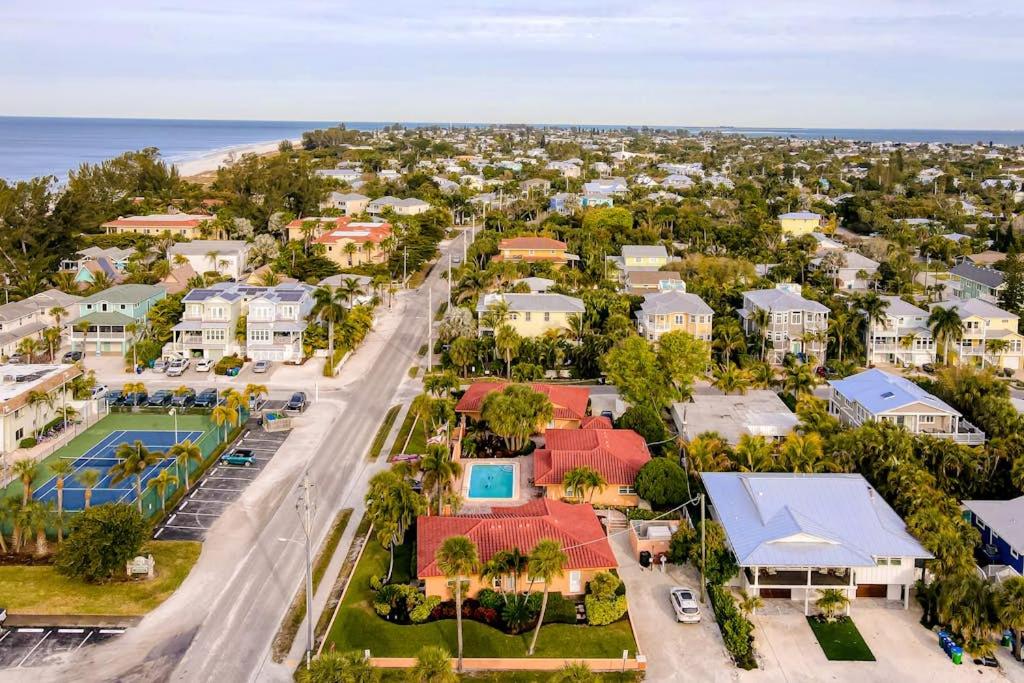 an aerial view of a town with houses and the ocean at The Villas, Condo 1A in Holmes Beach