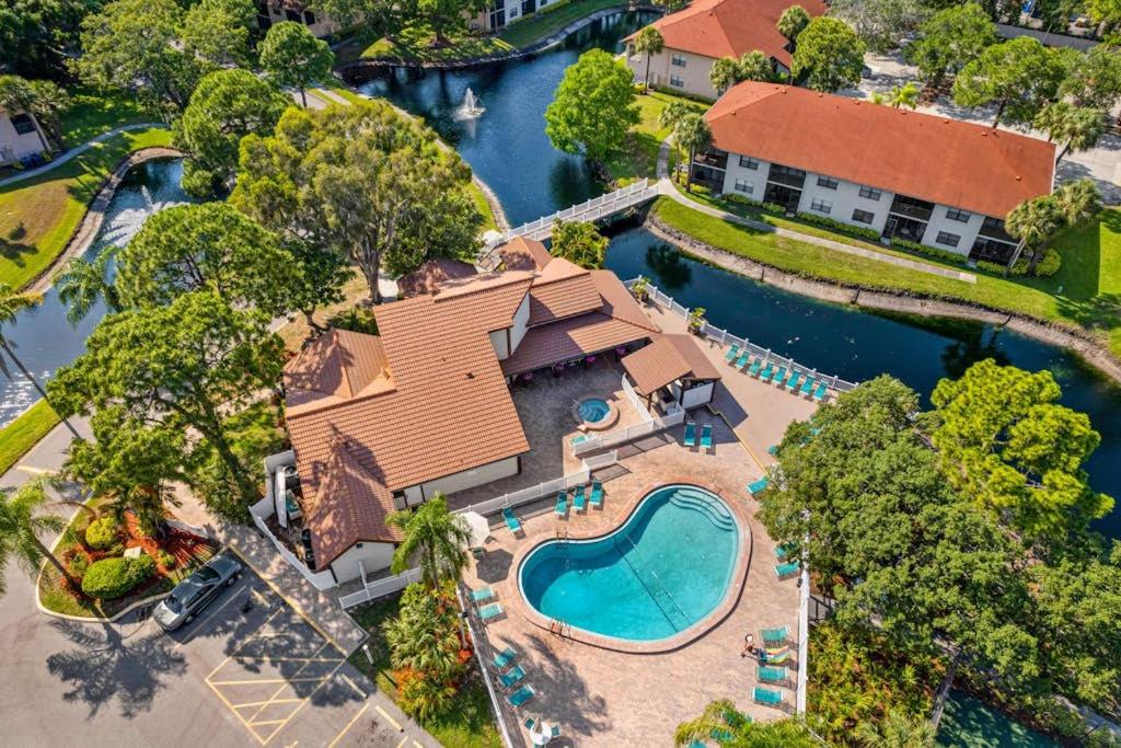 an aerial view of a house with a swimming pool at Shorewalk Villa in Bradenton