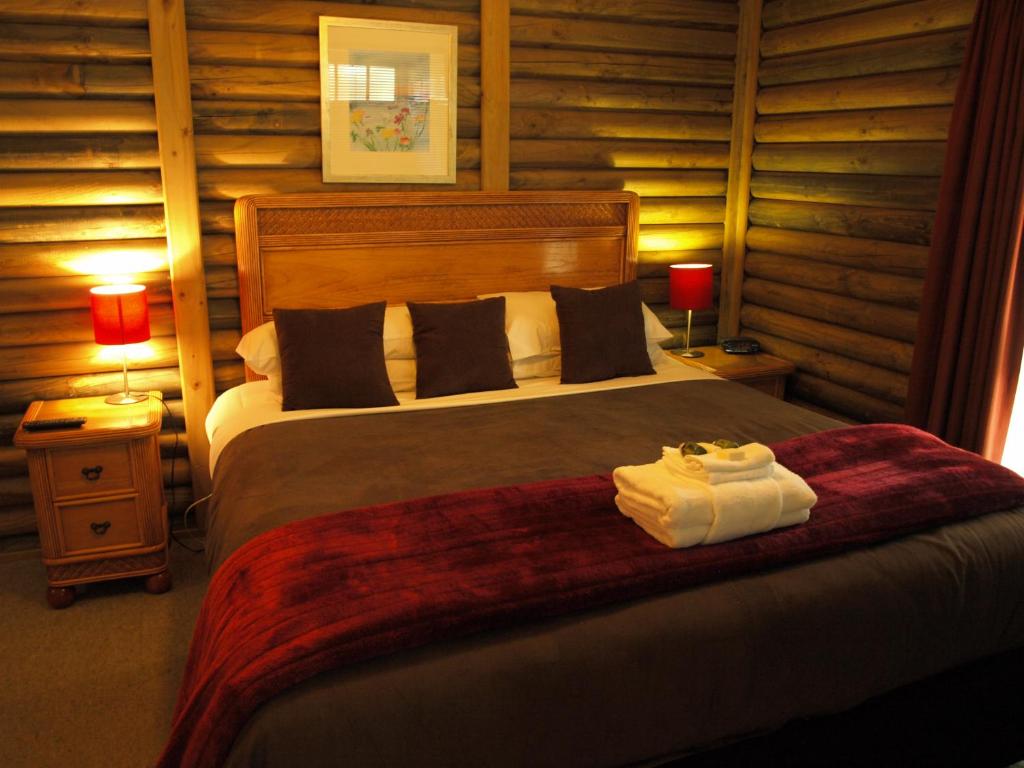 Postel nebo postele na pokoji v ubytování Ti-Tree Village