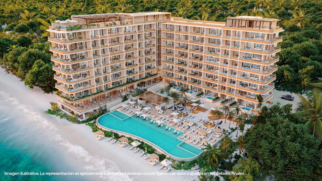 an aerial view of a resort on the beach at Inna Resort & Spa in Puerto Morelos