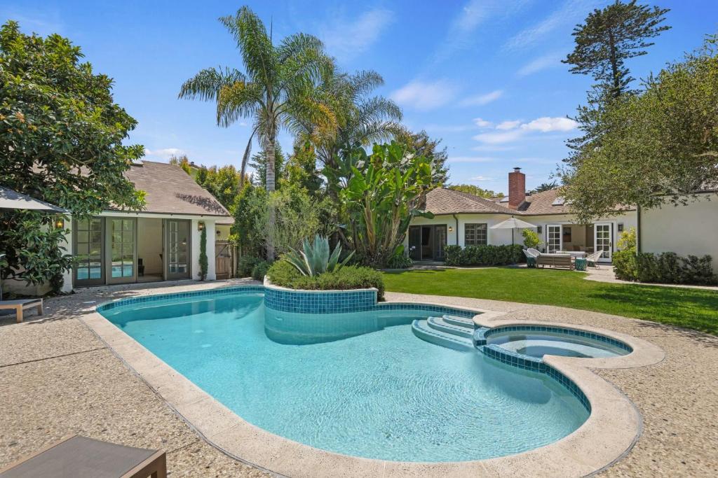 a swimming pool in the backyard of a house at Hedgerow Jewel Box in Santa Barbara