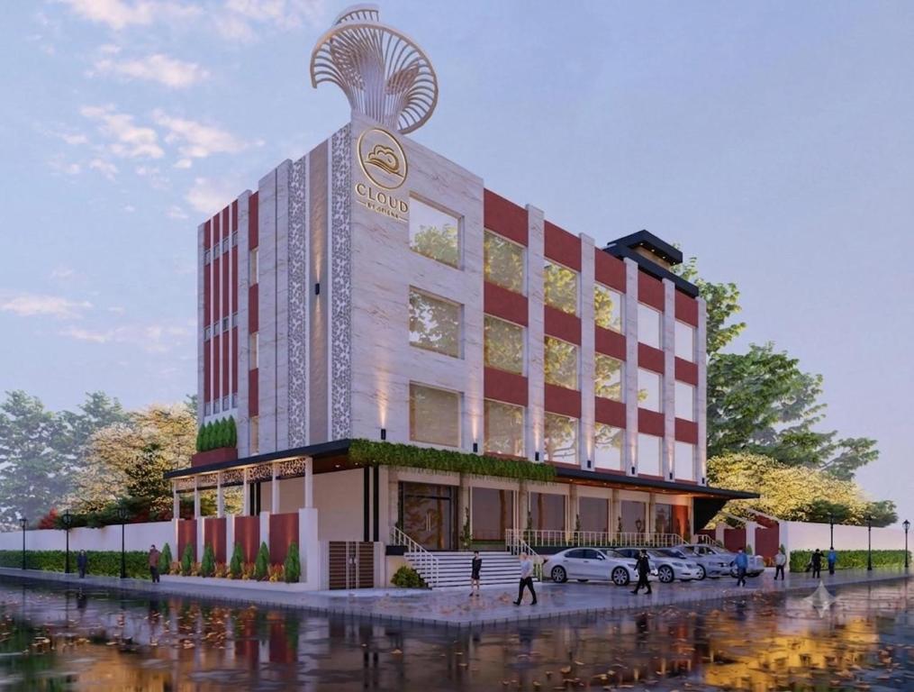 a rendering of a hotel with cars parked outside of it at Hotel Cloud by ARIENA in Phundardih