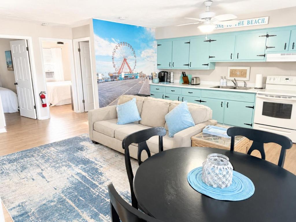 a kitchen and a living room with a table at Between Tides 2BR Walk to Beach Unit C in Seaside Park