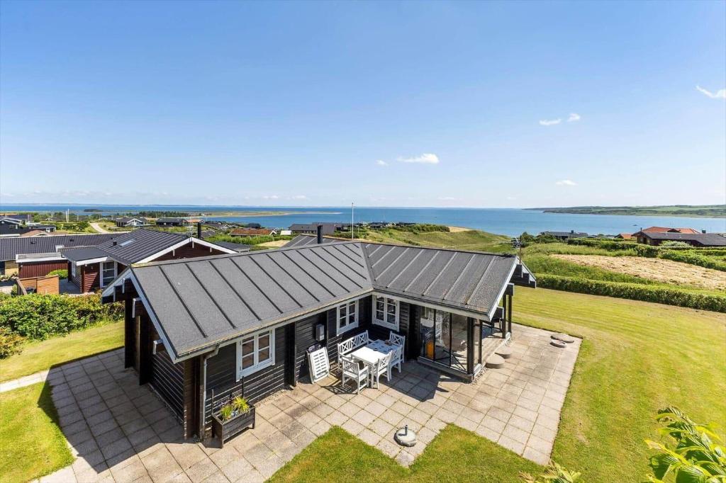 an aerial view of a house with the ocean in the background at G256-Lemvig-Bellisvej-56 in Lemvig