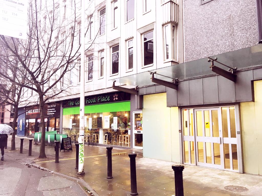 a store on the side of a city street at QuickSpaces Heart of the City in Manchester