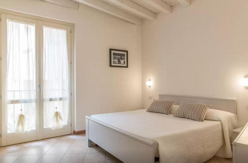 Postelja oz. postelje v sobi nastanitve Aromi Piccolo Hotel