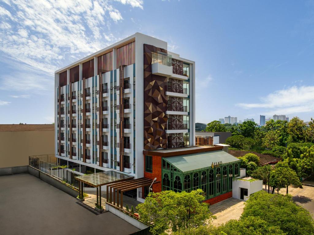 an overhead view of a building with a balcony at Elais by ARTOTEL in Medan