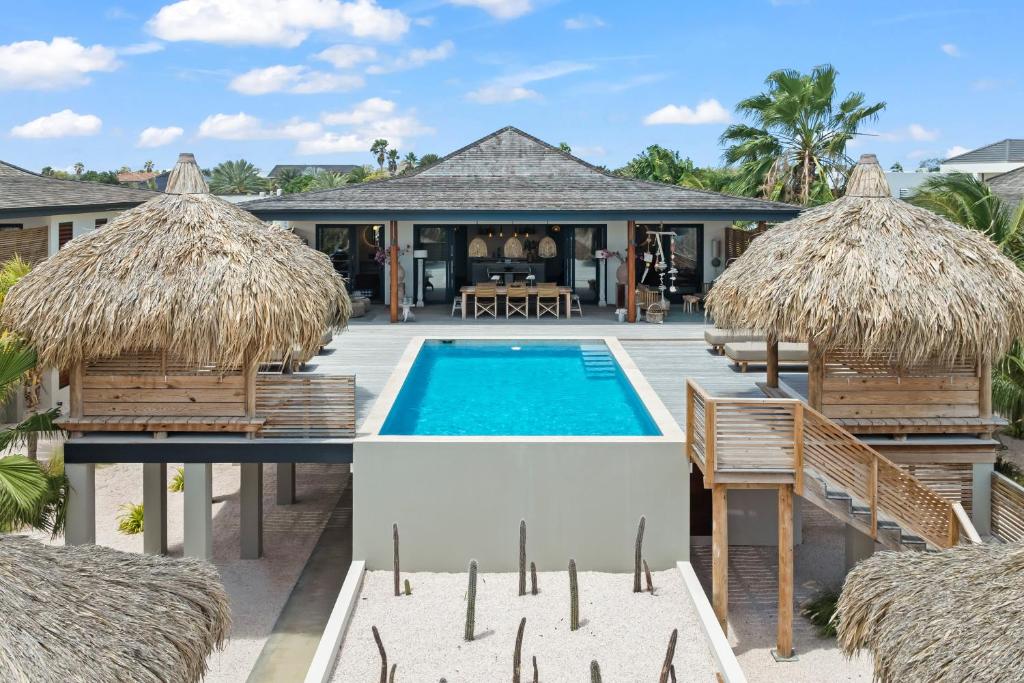 an image of a villa with a swimming pool at El Patrón, the villa in Jan Thiel