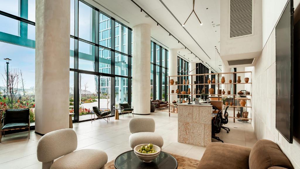 a lobby with a lot of windows at Jacob Modiin in Modi'in-Maccabim-Re'ut