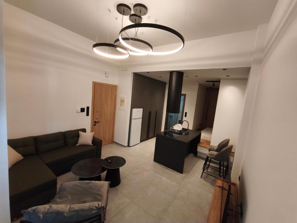 a living room with a couch and a table at Orestiada Centro apartment in Orestiada