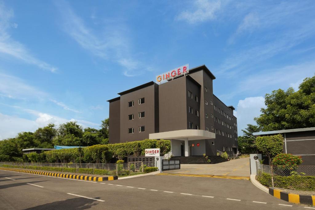 a building with a citagra sign on top of it at Ginger Pantnagar in Pantnagar
