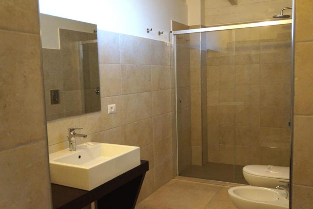 A bathroom at Appartamenti Serena