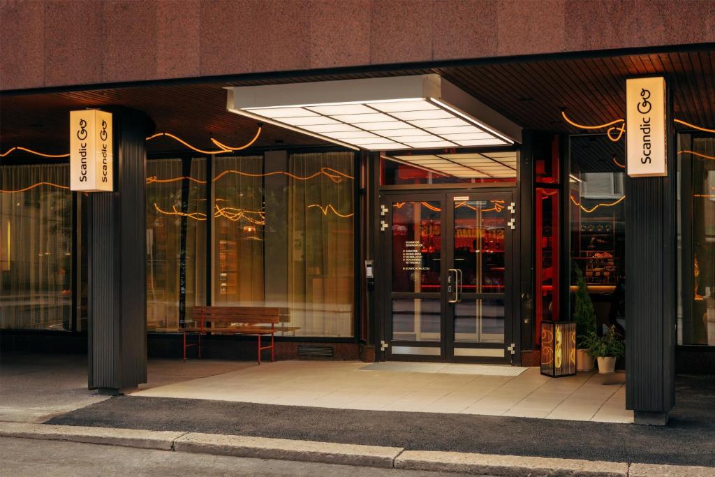 an entrance to a store with glass doors at Scandic Go, Eerikinkatu 30 in Turku