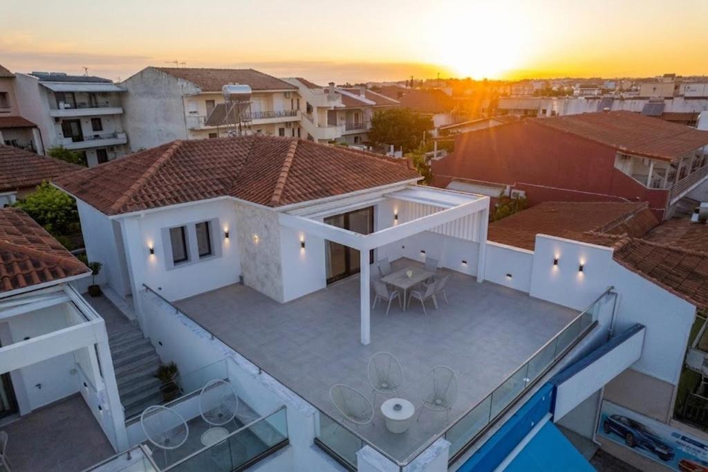 an aerial view of a house with a roof at Sunrise suites in Kallithea Halkidikis