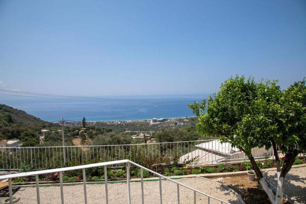 a view of the ocean from a house at Uzeiri Guest Hotel in Borsh