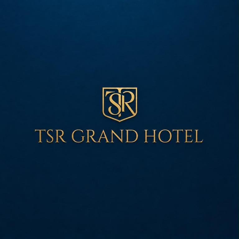 a tsr grand hotel logo on a blue background at TSR Grand Hotel in Bhogāpuram