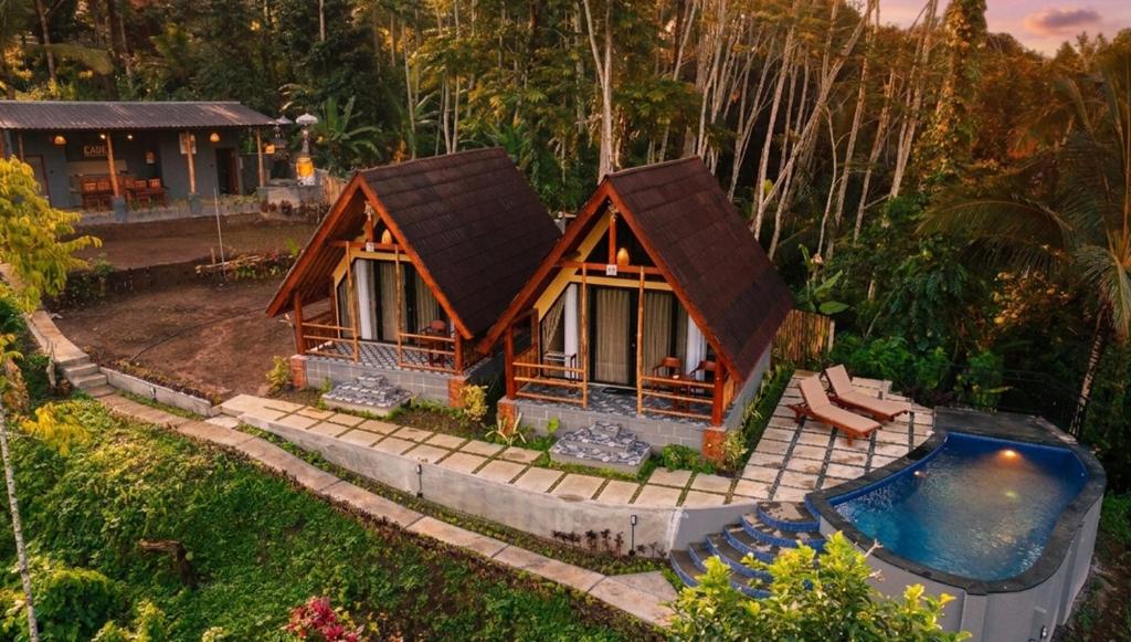 a model of a house and a swimming pool at The Grembeng in Undisan