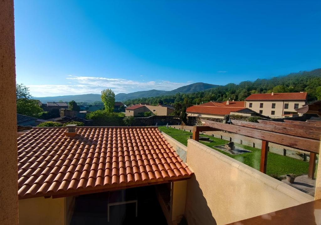 a view of the roof of a house with a view at Hotel Apartamento 3 Lobitos in Villardeciervos