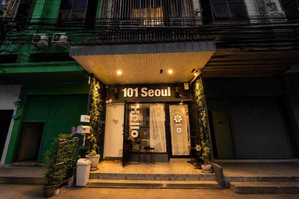 a south store with a sign on the front of it at 101 SEOUL HOSTEL (101 โซล โฮสเทล) in Bangkok