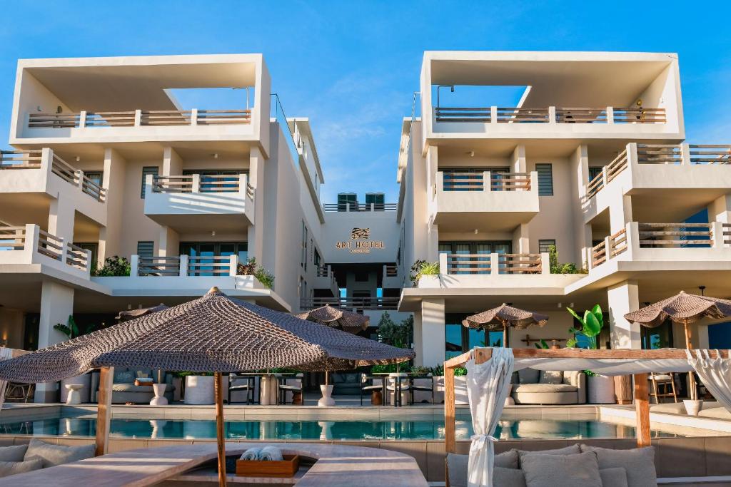 a view of the hotel from the pool at Art Hotel Curacao - Luxury Adults Only in Willemstad