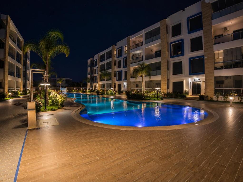Bazen u ili blizu objekta Appartement Haut Standing - 5 personnes - Résidence Gardénia avec Piscine - Parking