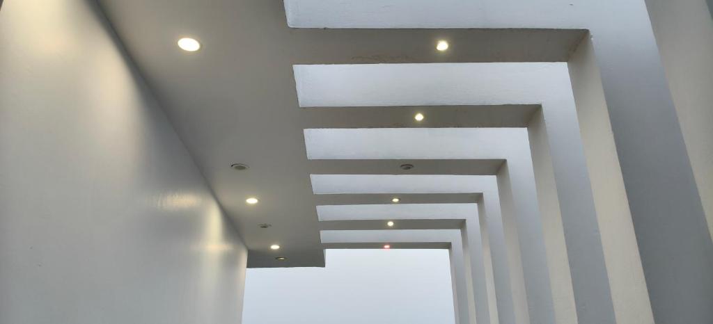 a view of the ceiling of a building at Hotel Golden Spark in Jewar