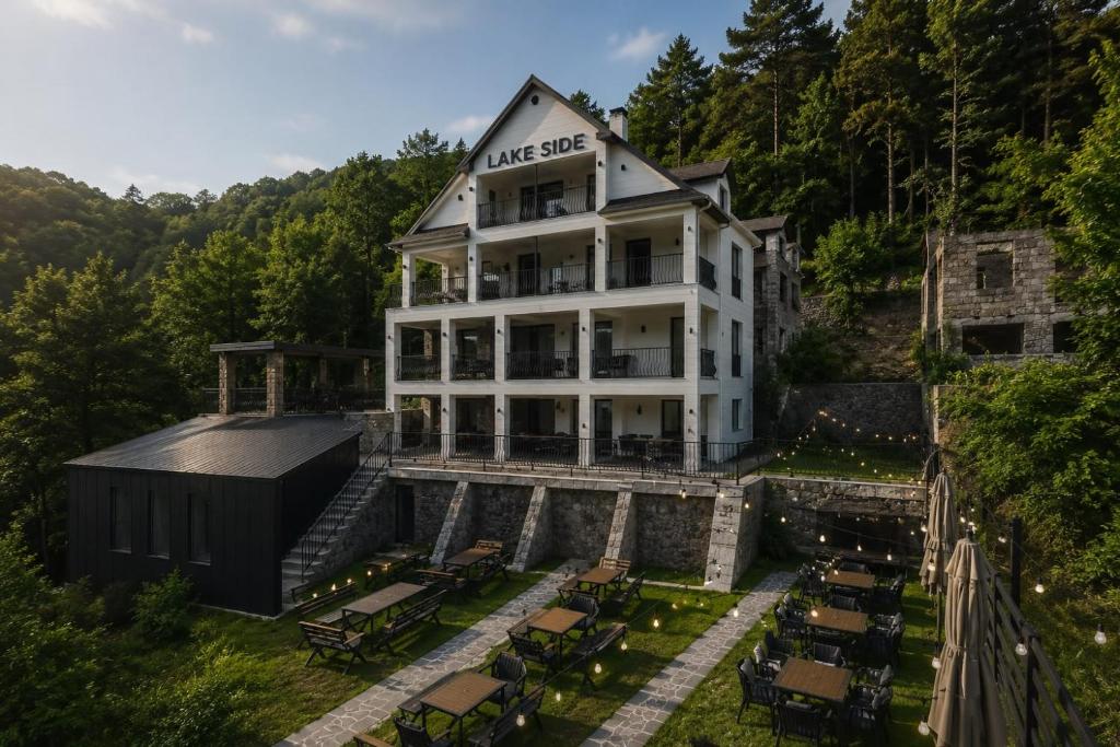 an aerial view of a building with tables and chairs at Lake side Dilijan in Dilijan