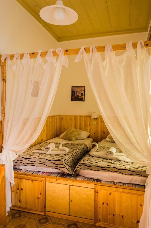 Postel nebo postele na pokoji v ubytování Villa Soultana