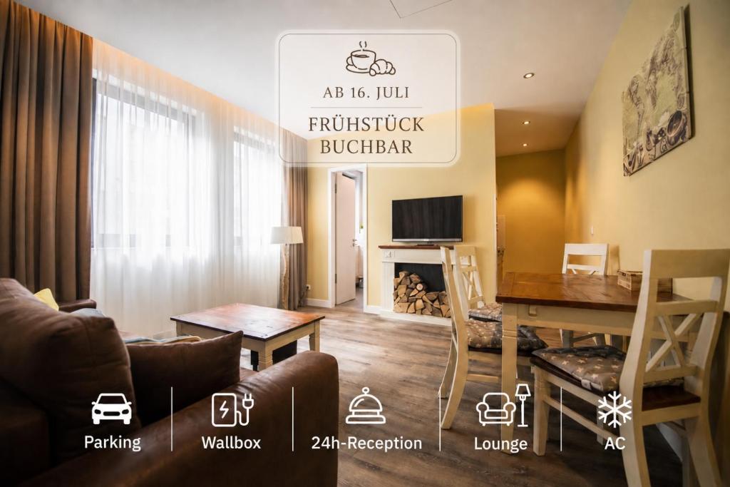 a living room with a couch and a table at Hotel Apartment Central Leipzig-City & Zoo in Leipzig
