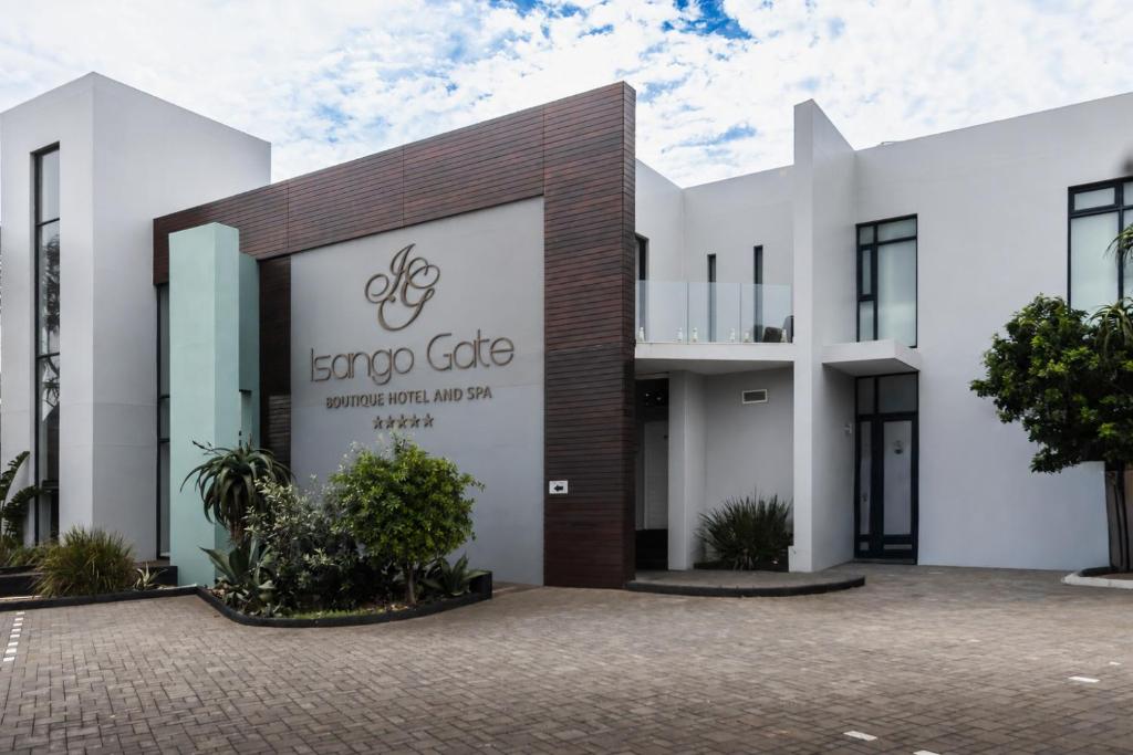 a building with a sign for an eco cafe at Isango Gate in Port Elizabeth
