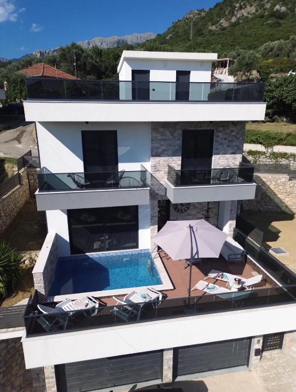 an aerial view of a house with a swimming pool at Villa Nova Bar in Bar