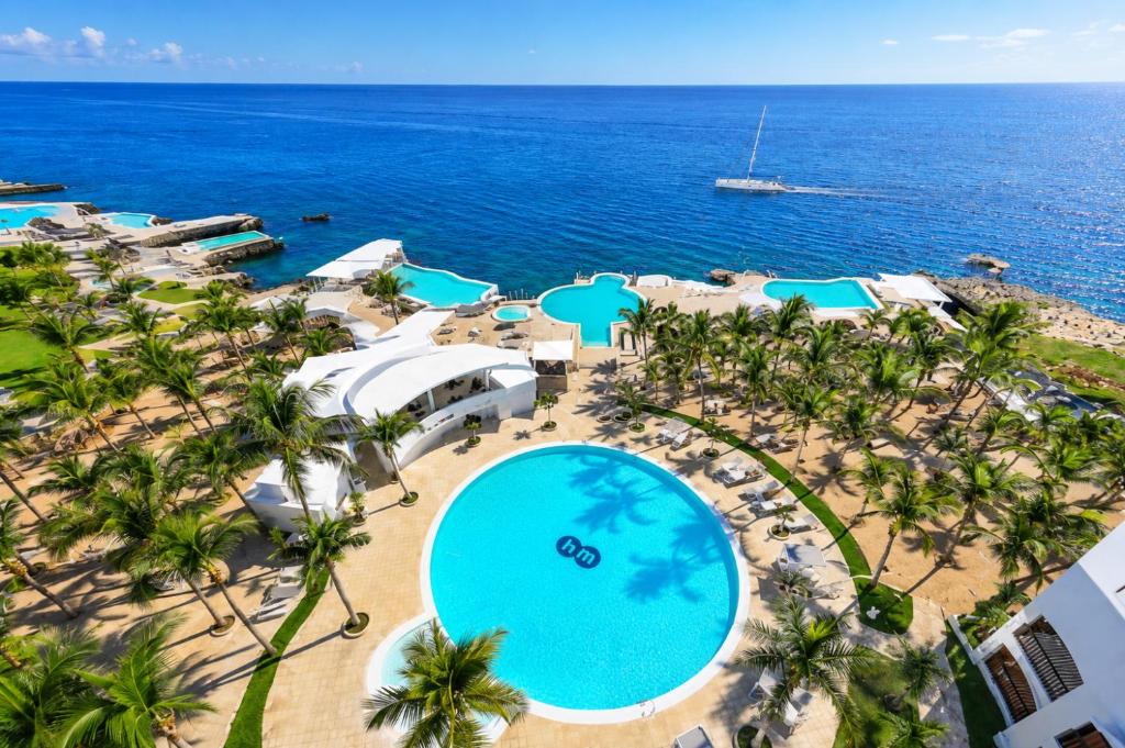 an aerial view of the pool at the resort at Sol Dominicus 1 Apartamento con Cocina Solo Adultos in La Laguna